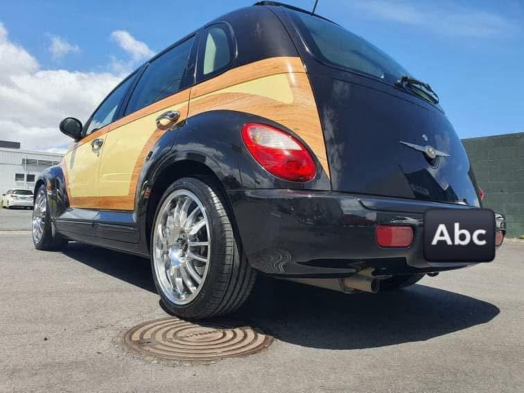 Low rear view of the finished car showing the woodgrain panels