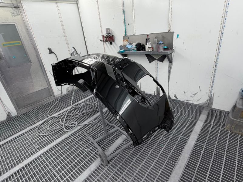 Front bumper on a stand after painting